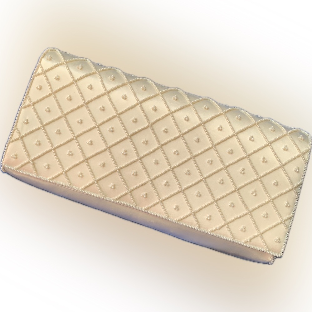 Cream Quilted Clutch with small pearl embellishments, perfect for a wedding